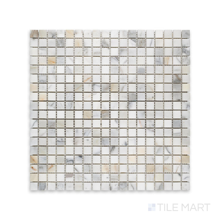 This 5/8 inch square mosaic in honed Calacatta Gold Marble is viewed from above, revealing tight grid layout and gentle matte finish.