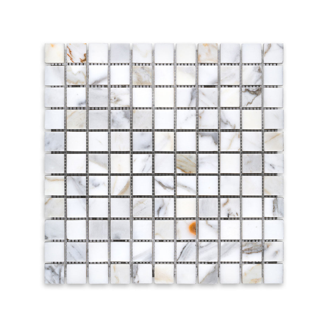 Top view of 1 inch square honed Calacatta Gold Marble mosaic, with clean lines and soft texture enhancing its natural veining.