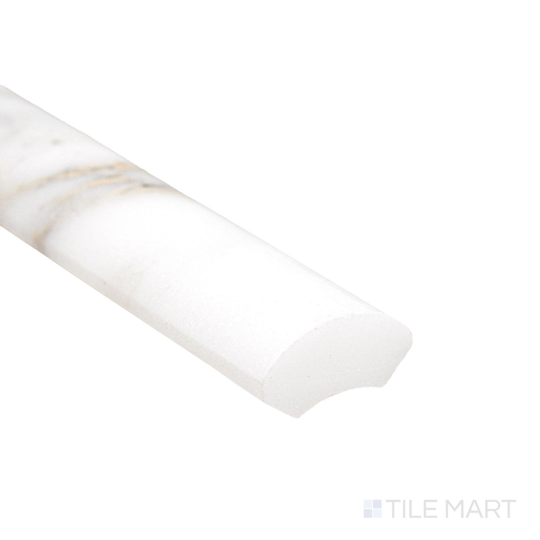 Corner detail of Calacatta Gold Marble 1x12 polished quarter round highlighting glossy curved profile and golden veining.