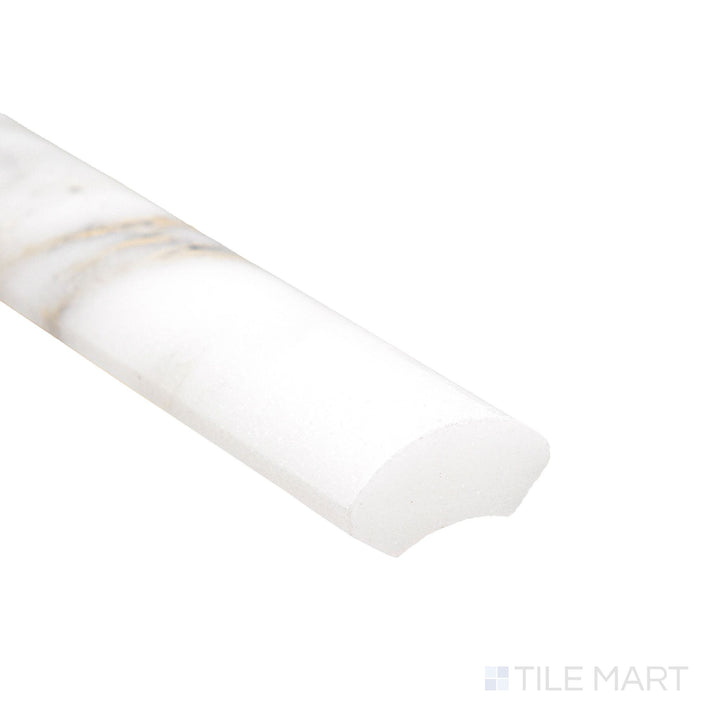 Corner detail of Calacatta Gold Marble 1x12 polished quarter round highlighting glossy curved profile and golden veining.