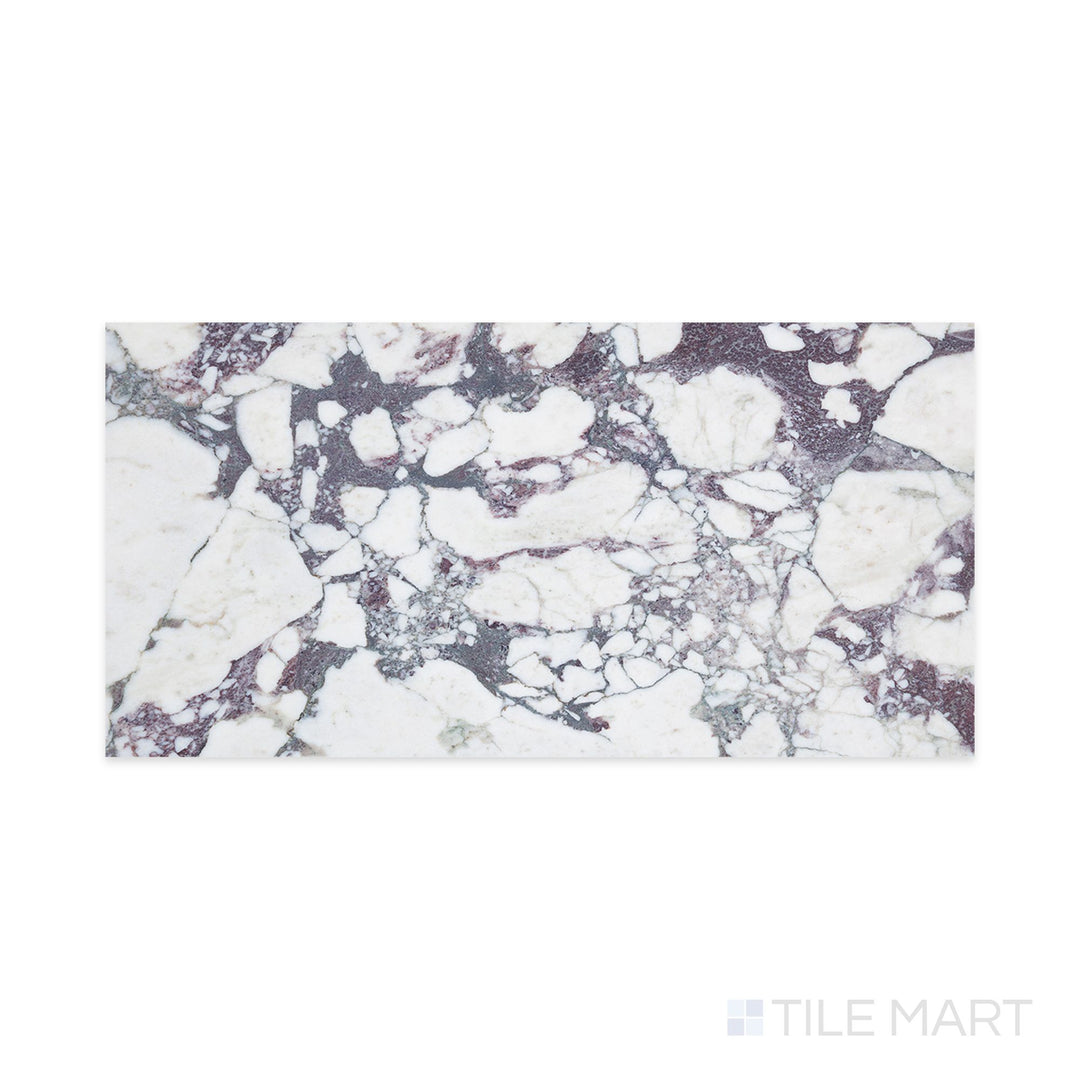 Top-down image of Calacatta Viola Marble 12x24 honed tile, displaying a creamy white surface with bold, deep purple and burgundy veining in a matte finish.