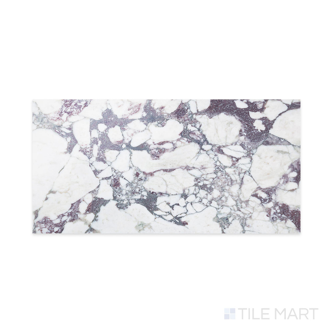 Flat-lay of Calacatta Viola Marble 12x24 polished tile, featuring vivid maroon and violet veining over a white background with a high-gloss finish.