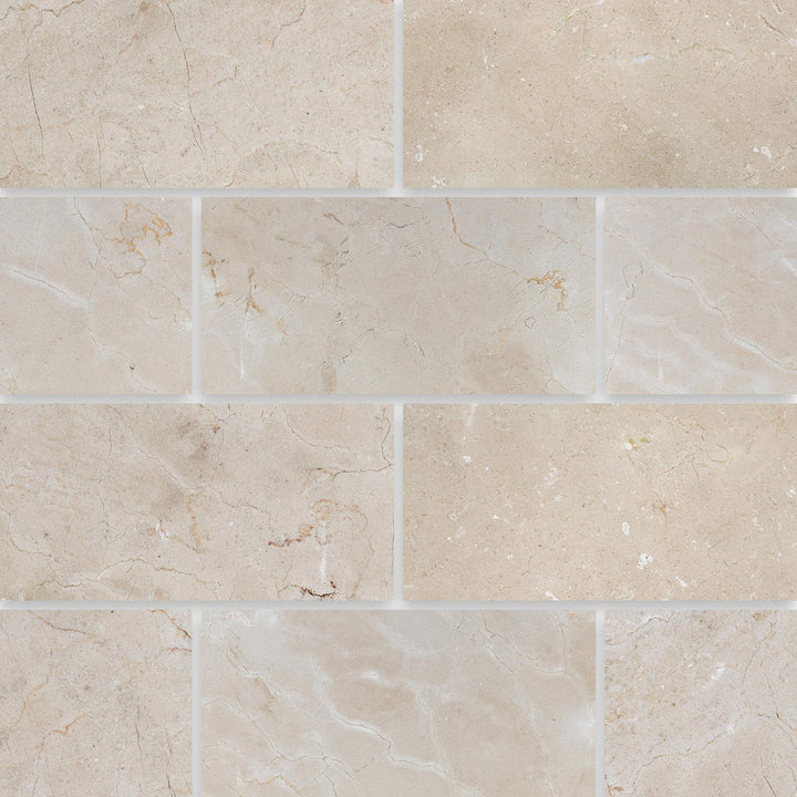 Overview view of Crema Marfil Classic Marble 3x6 Honed Tile, showcasing its warm beige tones and subtle veining for timeless, sophisticated interiors.