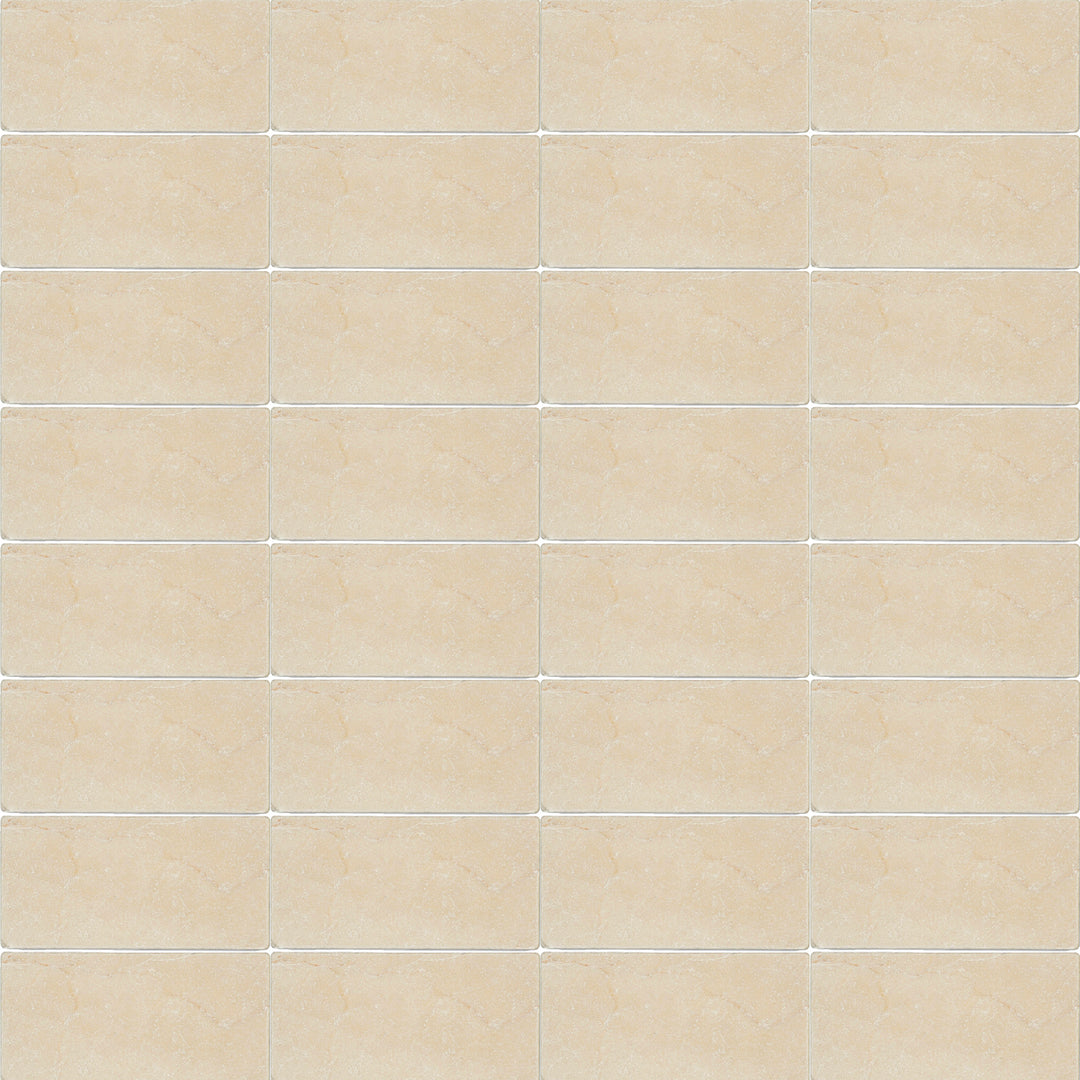 Crema Marfil Classic Marble 3x6 tumbled tile layout with rounded edges and a naturally aged appearance.