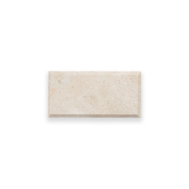 Top-down perspective of Crema Marfil Classic Marble 3x6 tile with beveled edges and a honed finish, blending classic detail with subtle elegance.