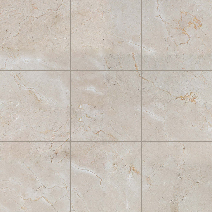 Overview of 12x12 honed Crema Marfil Classic Marble tiles arranged to showcase warm beige hues in a square grid.