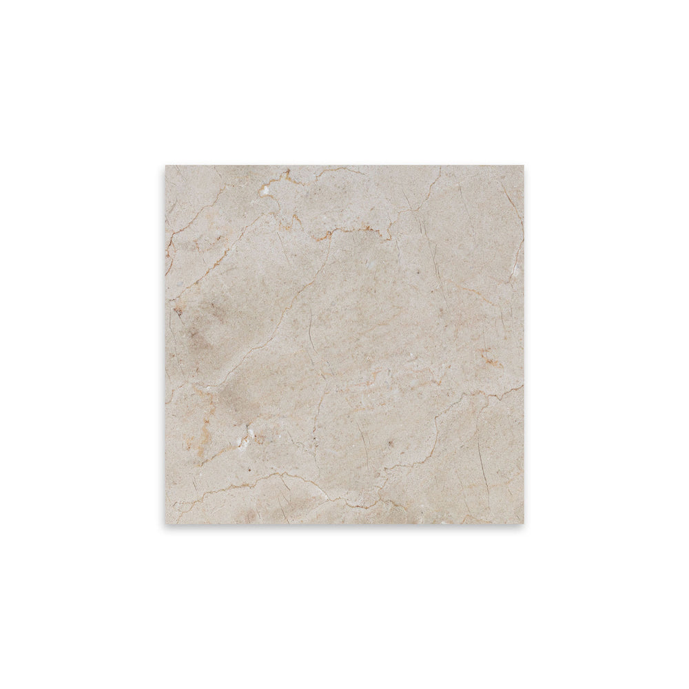 Top-down view of Crema Marfil Classic Marble 12x12 tile in honed finish, offering a smooth matte surface and warm beige coloration ideal for elegant interiors.