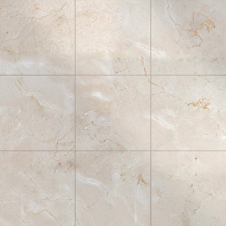 Polished 12x12 Crema Marfil Classic Marble tiles laid out to reflect the high-gloss finish and natural veining.