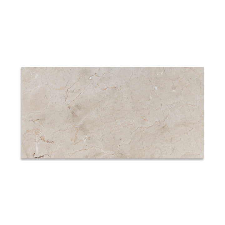 Seen from above, this 12x24 Crema Marfil Classic Marble tile features a honed finish and extended rectangular format with subtle natural texture.