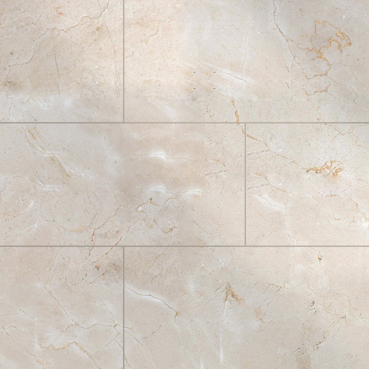 Glossy 12x24 polished Crema Marfil Classic Marble tiles arranged to highlight the large-format shine and soft veining.