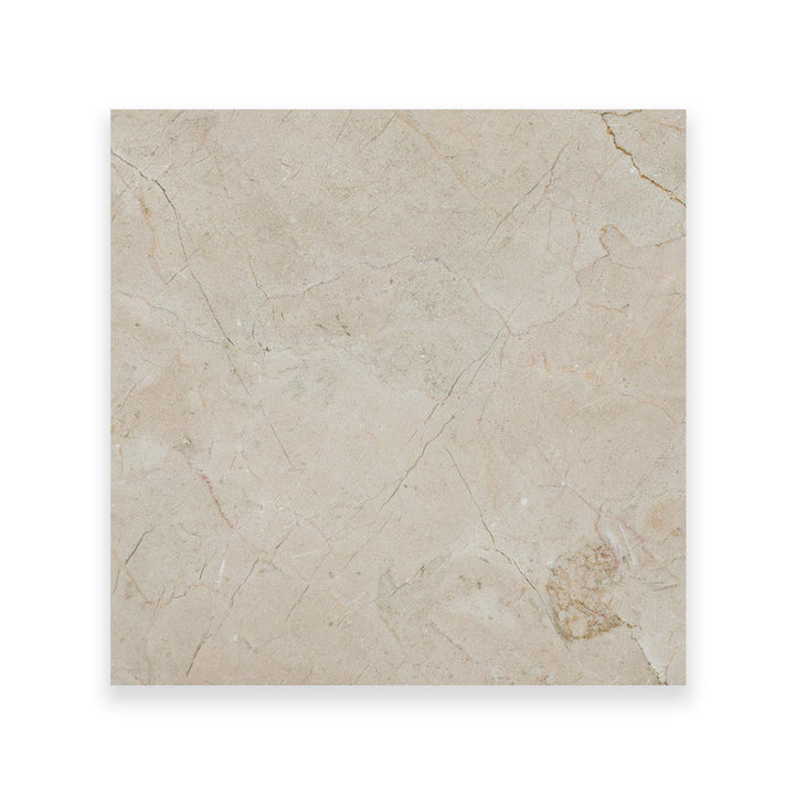 This 24x24 honed Crema Marfil Classic Marble tile seen from above offers a spacious, soft-finish surface with timeless creamy tones.
