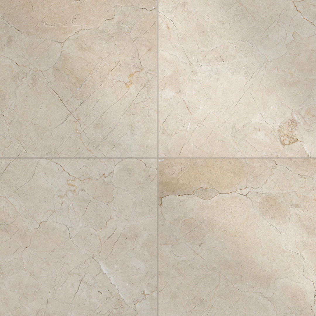 24x24 polished Crema Marfil Classic Marble tiles shown in a wide layout to highlight the high-gloss creamy appearance.