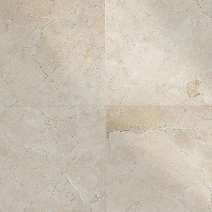 24x24 polished Crema Marfil Classic Marble tiles shown in a wide layout to highlight the high-gloss creamy appearance.