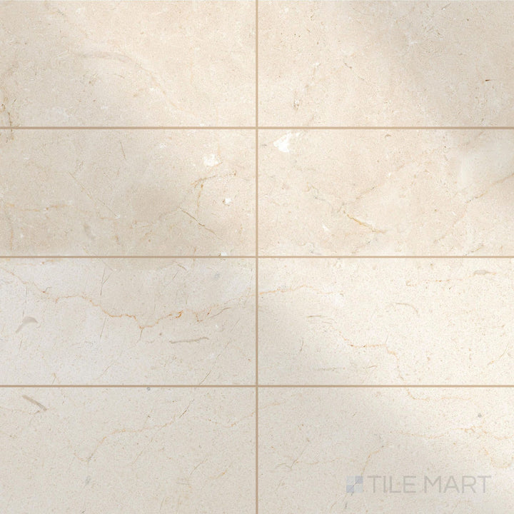 Top view of 6x12 polished Crema Marfil Select Marble tiles with glossy finish and subtle golden veining.