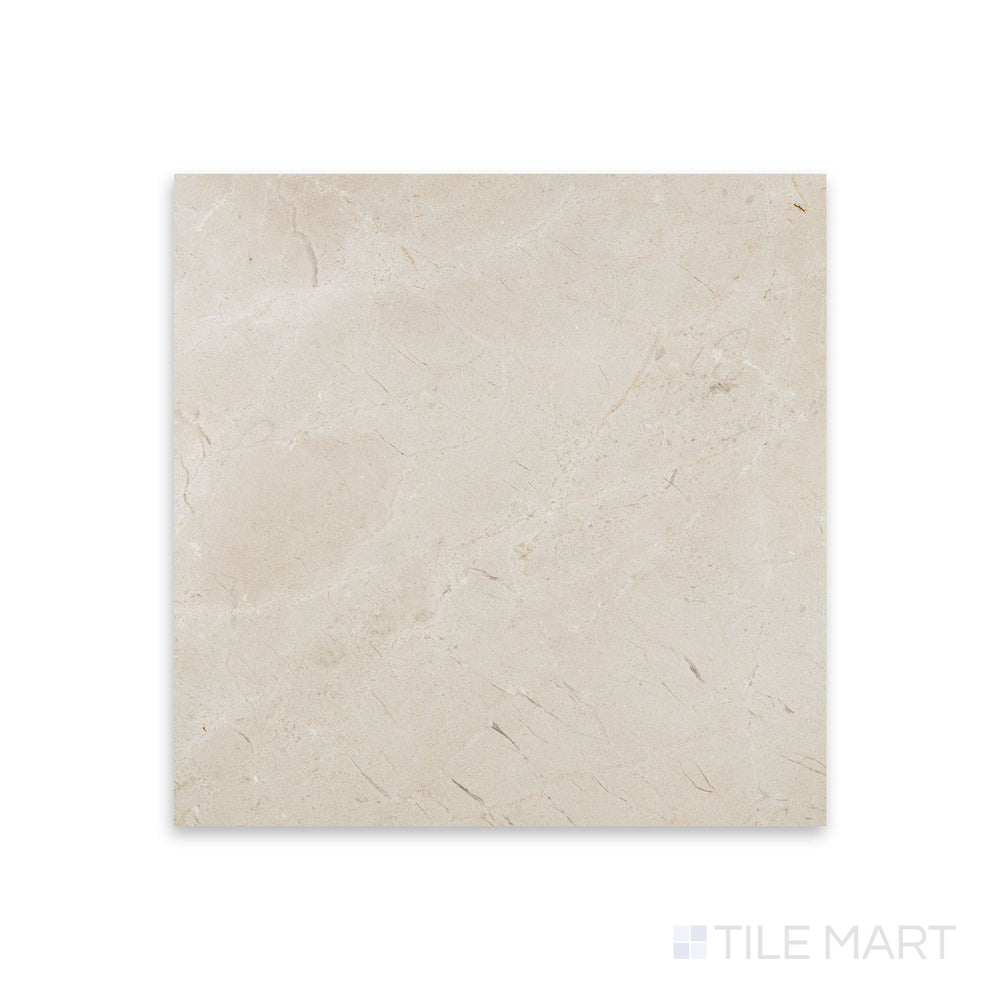 Overhead shot of Crema Marfil Select Marble 12x12 honed tile, showcasing soft matte appeal and light veining for balanced, classic styling.