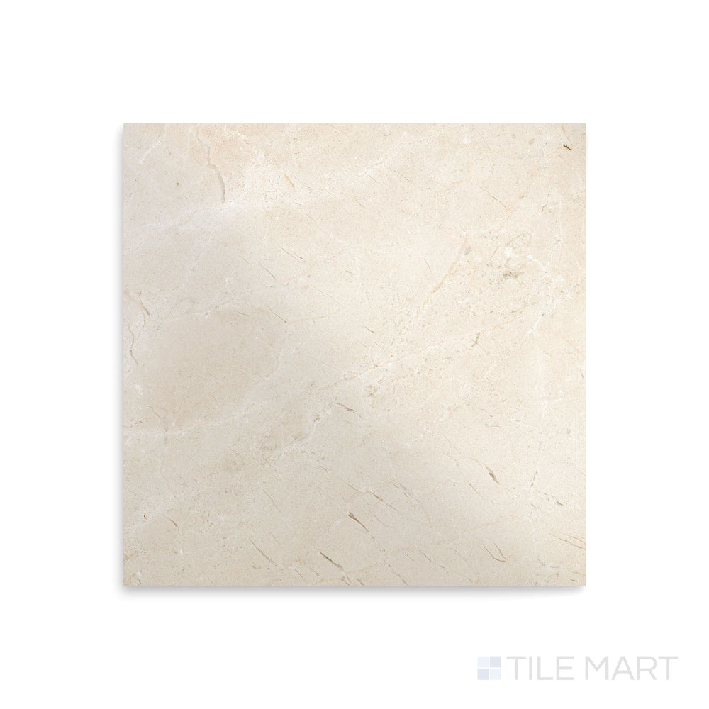Polished Crema Marfil Select Marble tile in 12x12 format seen from above, revealing a lustrous finish with creamy tones and natural elegance.