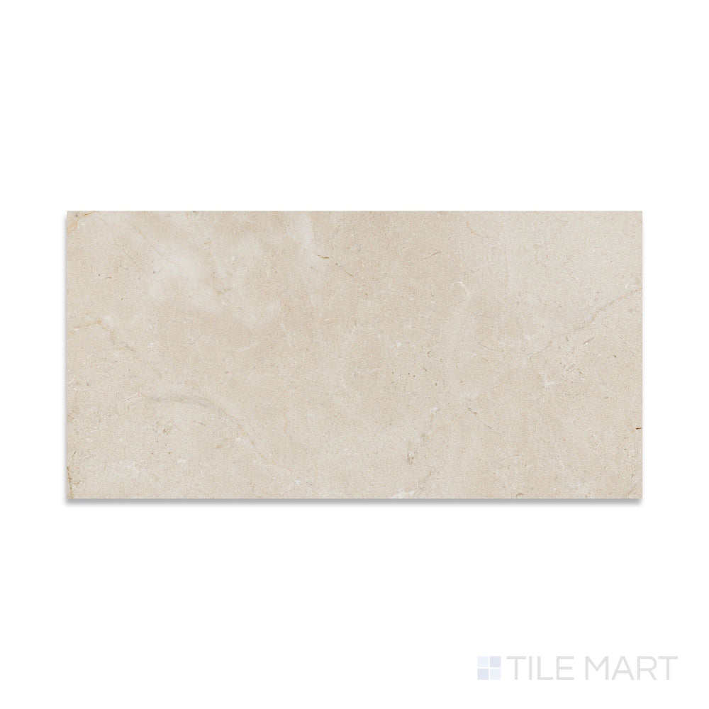 Top-down view of Crema Marfil Select Marble 12x24 tile in honed finish, offering a soft matte surface and subtle veining in an elongated format.