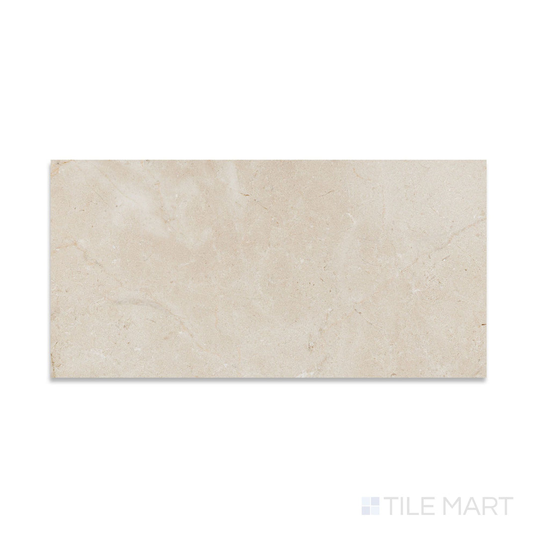 Top-down view of Crema Marfil Select Marble 12x24 tile in honed finish, offering a soft matte surface and subtle veining in an elongated format.
