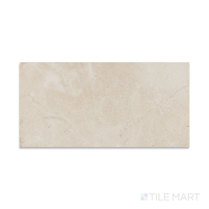 Top-down view of Crema Marfil Select Marble 12x24 tile in honed finish, offering a soft matte surface and subtle veining in an elongated format.