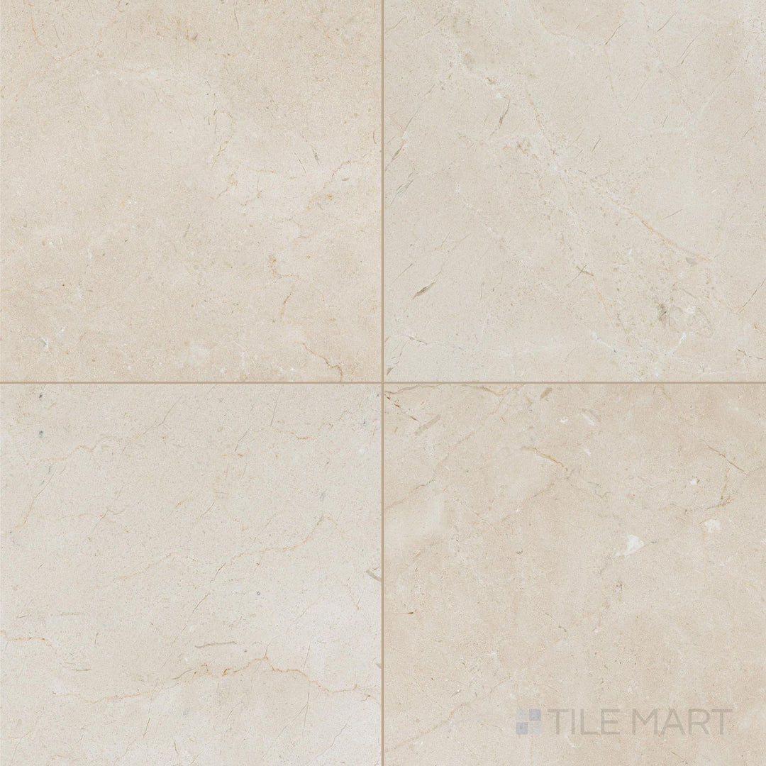 18x18 honed Crema Marfil Select Marble tiles placed in a neat square formation emphasizing muted beige tones.