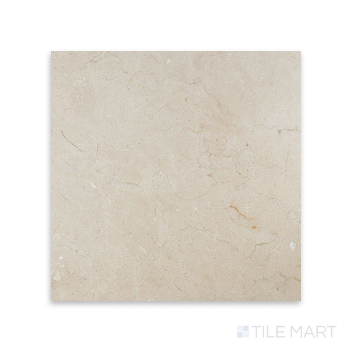 Seen from above, the honed 18x18 Crema Marfil Select Marble tile reveals a smooth, warm-toned surface ideal for traditional or modern floors.