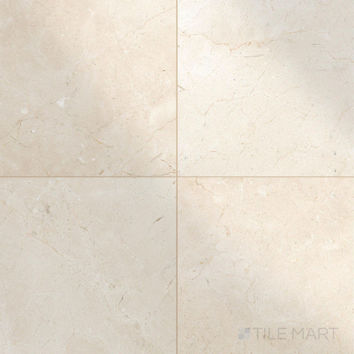 Highly polished 24x24 Crema Marfil Select Marble tiles displayed in a layout that highlights their reflective quality.