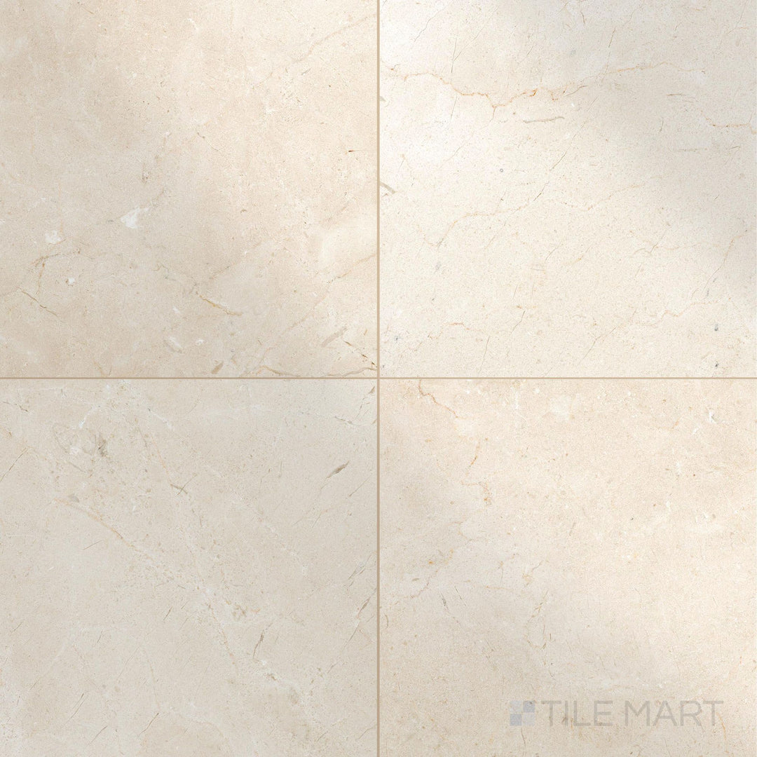 Highly polished 24x24 Crema Marfil Select Marble tiles displayed in a layout that highlights their reflective quality.