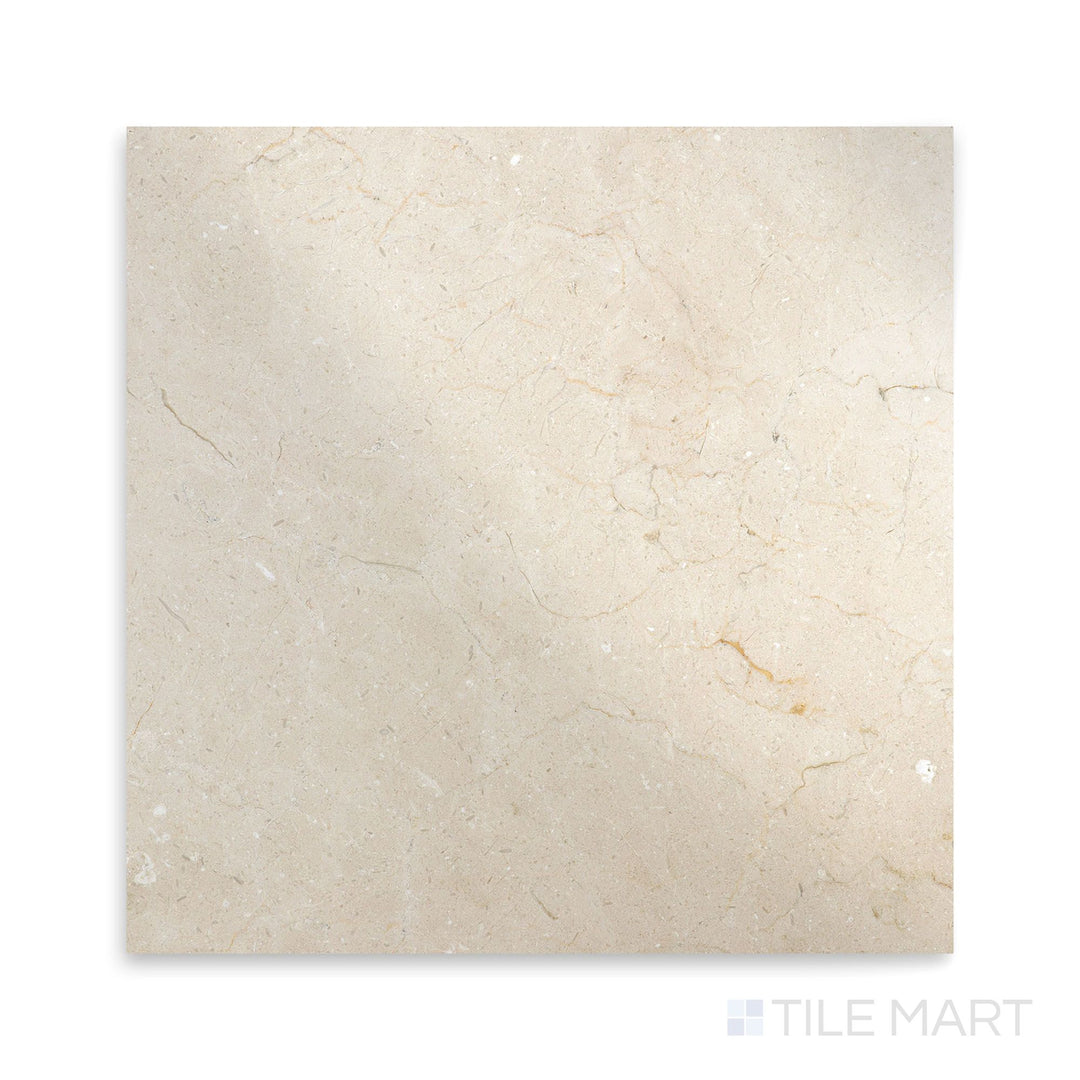 Overhead shot of Crema Marfil Select Marble 24x24 polished tile, showing elegant veining and a glossy finish suited for premium interiors.
