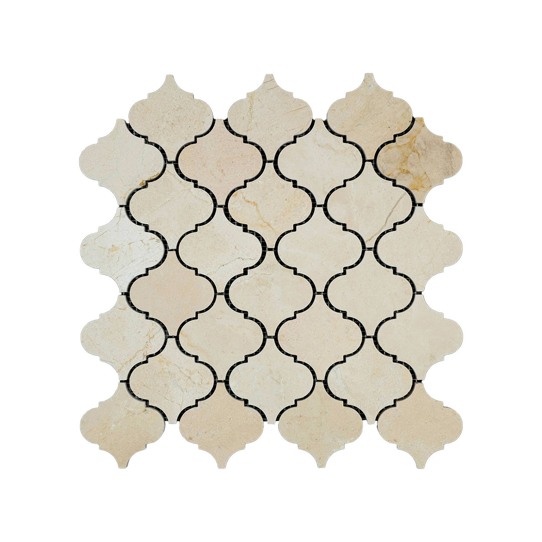 Top-down image of Crema Marfil Marble 3 inch lantern mosaic in a honed finish, featuring classic curves and soft beige tones with natural texture.