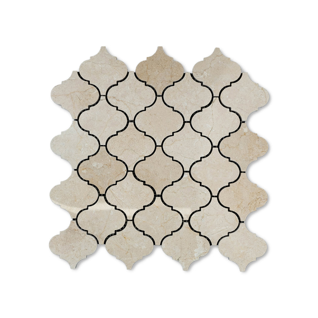Polished Crema Marfil Marble 3 inch lantern mosaic shown from above, combining elegant marble veining with a lustrous surface and graceful shape.