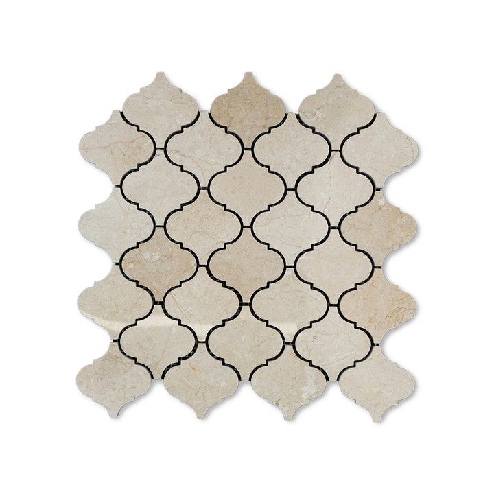 Polished Crema Marfil Marble 3 inch lantern mosaic shown from above, combining elegant marble veining with a lustrous surface and graceful shape.