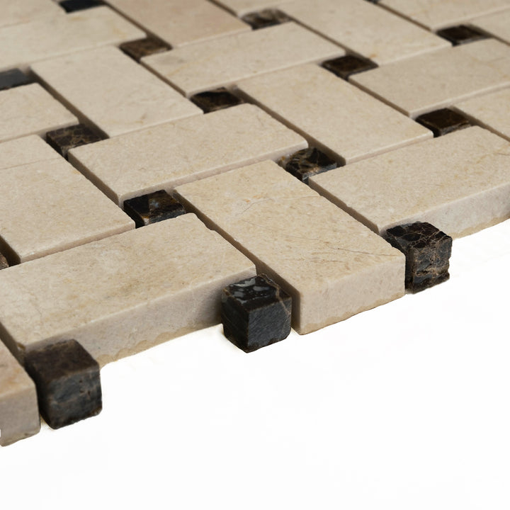 Corner-shot of honed Crema Marfil basketweave mosaic with brown dots, combining neutral elegance with a subtle accent in a timeless layout.