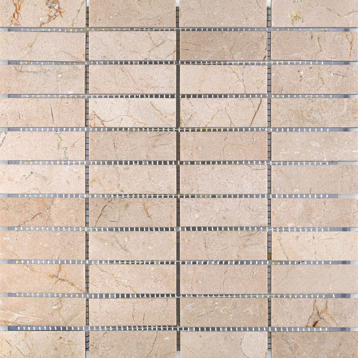 Crema Marfil Marble 1x3 stacked honed mosaic presented in an aligned overview that enhances the soft matte finish.