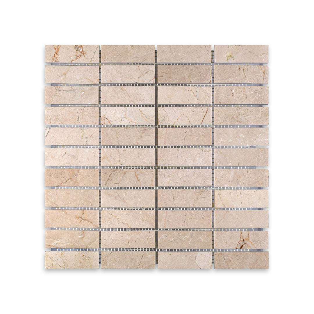 Seen from above, this 1x3 stacked honed Crema Marfil Marble mosaic features a linear layout with a soft matte finish and warm neutral appeal.