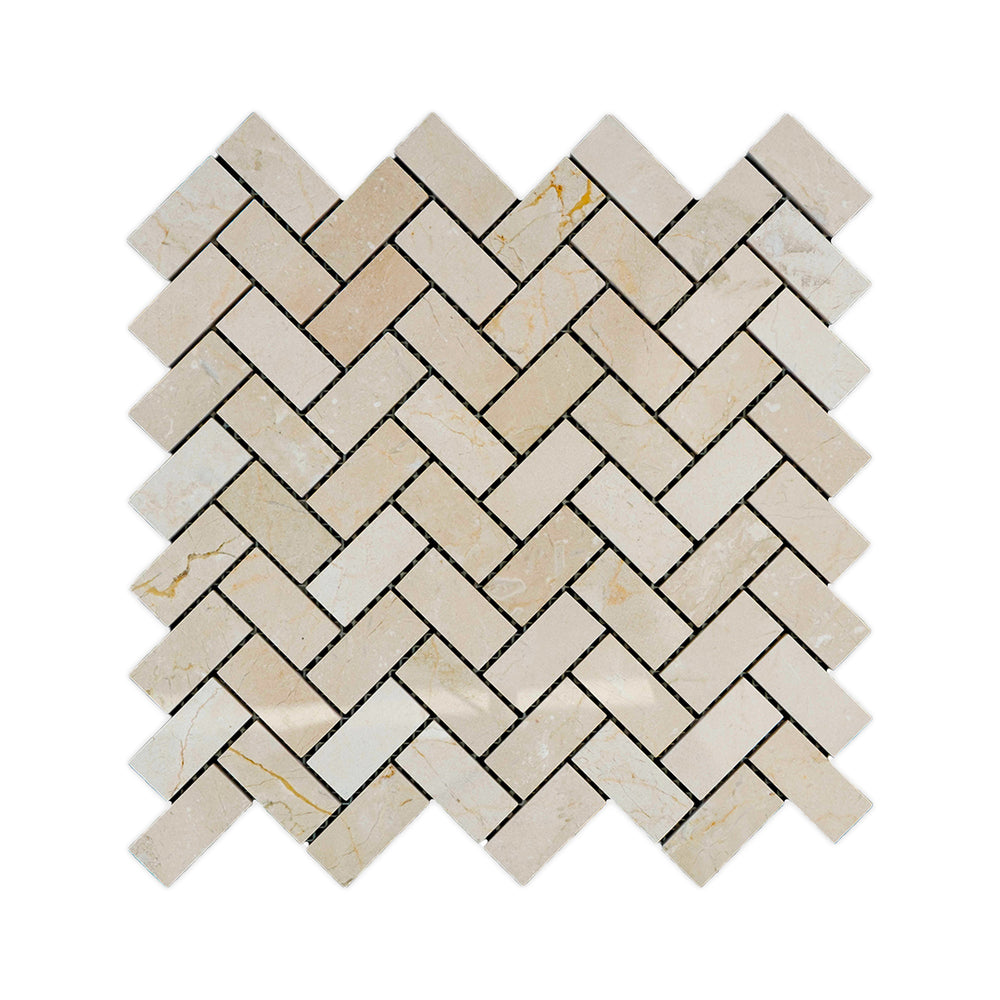 Polished Crema Marfil Marble 1x2 herringbone mosaic captured from above, with clean symmetry and luxurious surface shine.