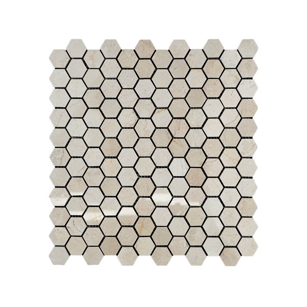 Top-down image of polished 1 inch hexagon Crema Marfil Marble mosaic, delivering high-gloss elegance with classic beige coloration.