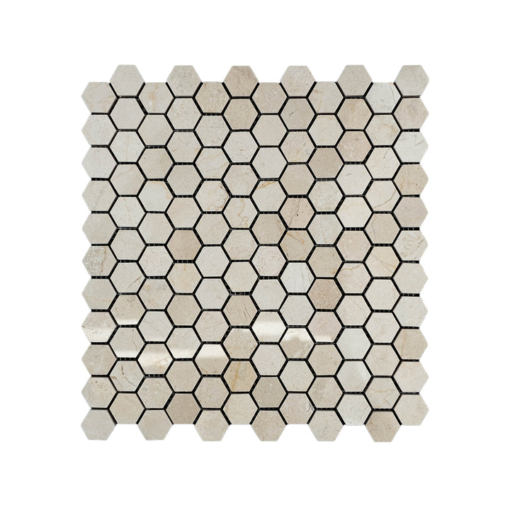 Top-down image of polished 1 inch hexagon Crema Marfil Marble mosaic, delivering high-gloss elegance with classic beige coloration.