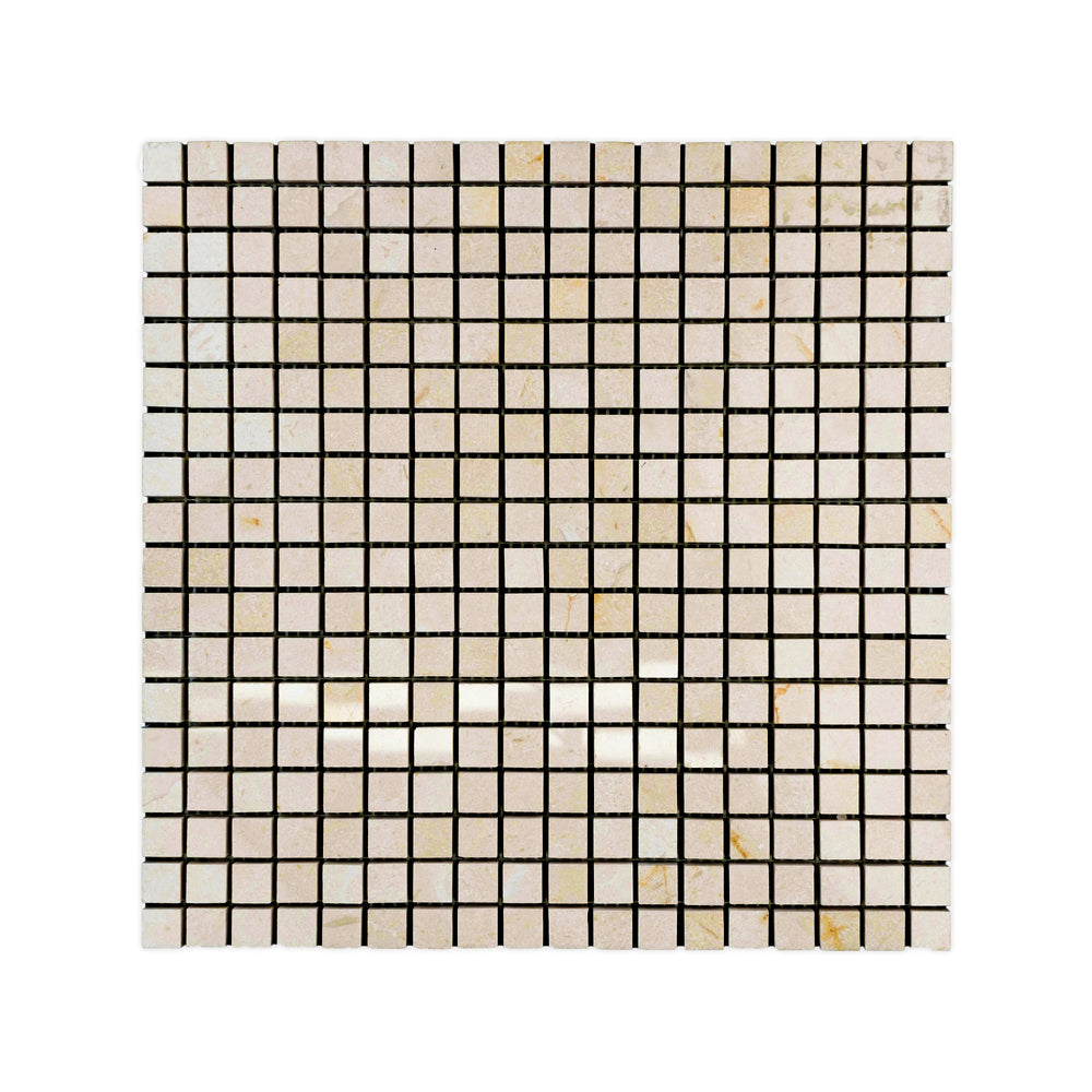 Top-down image of polished 5/8 inch square Crema Marfil Marble mosaic, featuring precise alignment and glossy surfaces in a soft beige palette.