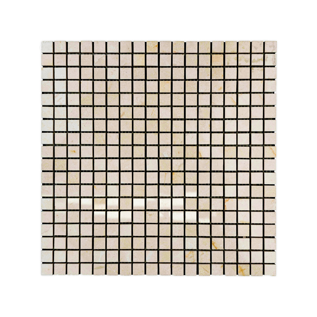 Top-down image of polished 5/8 inch square Crema Marfil Marble mosaic, featuring precise alignment and glossy surfaces in a soft beige palette.