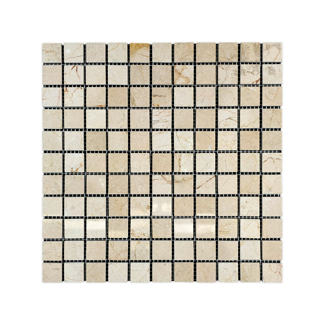 Polished 1 inch square Crema Marfil Marble mosaic seen from above, highlighting smooth finishes and classic beige coloration in a timeless tile layout.