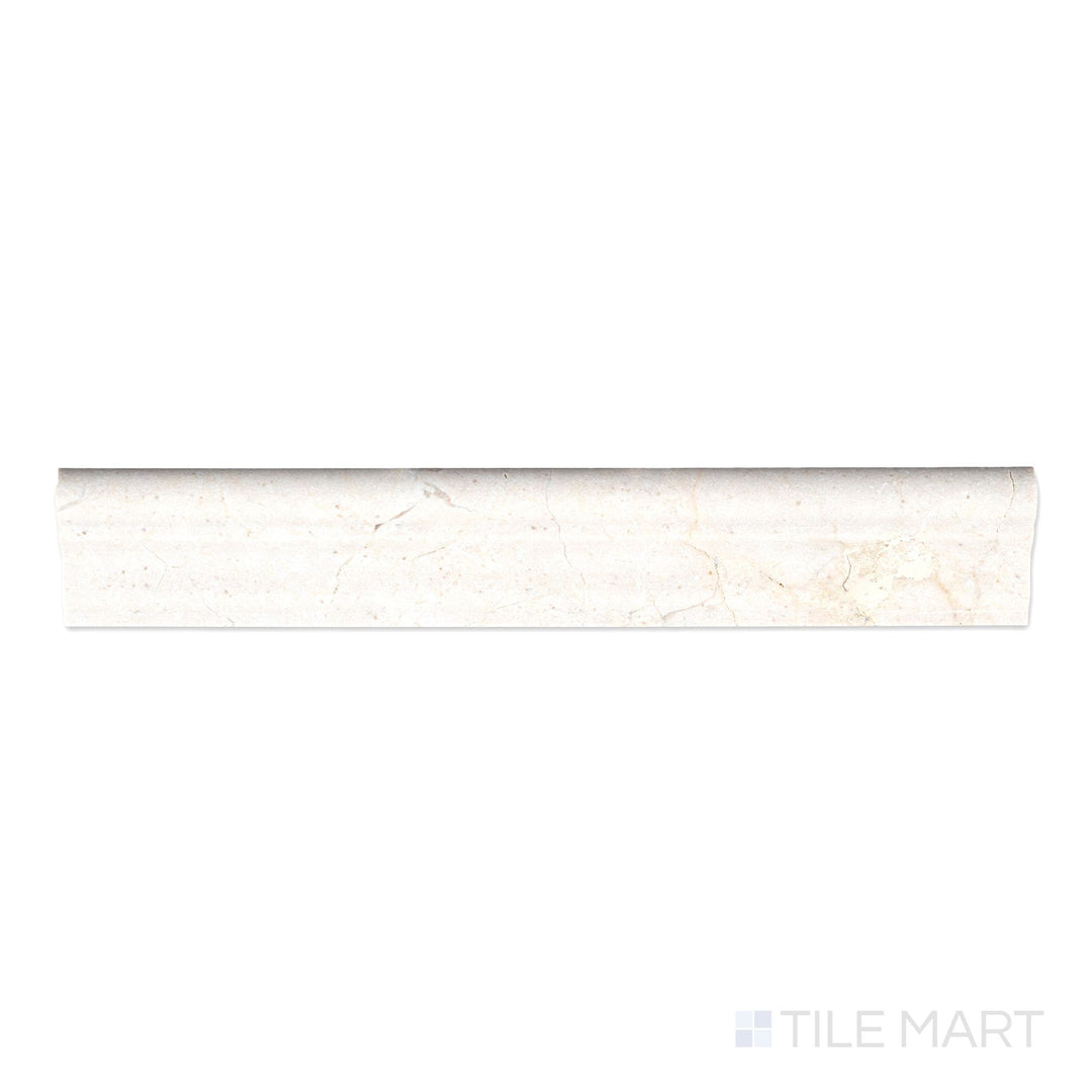 Flat-lay of Crema Marfil Marble 2x12 polished grand chair rail, showing a glossy surface with warm beige tones and faint natural marbling.