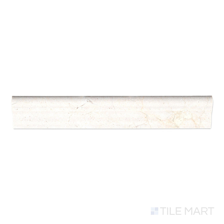 Flat-lay of Crema Marfil Marble 2x12 polished grand chair rail, showing a glossy surface with warm beige tones and faint natural marbling.