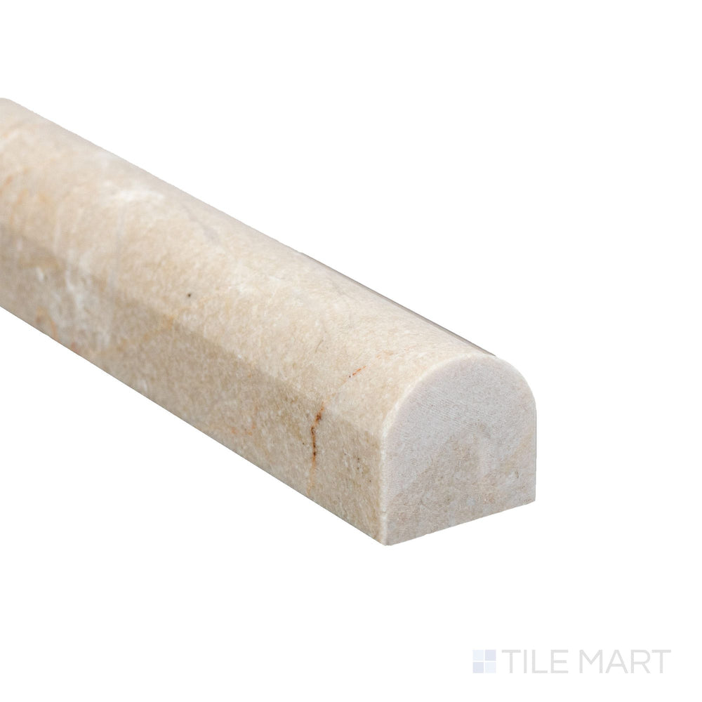 At the edge, the Crema Marfil Marble 0.75x12 honed standard liner shows a clean matte surface with subtle tonal variation.