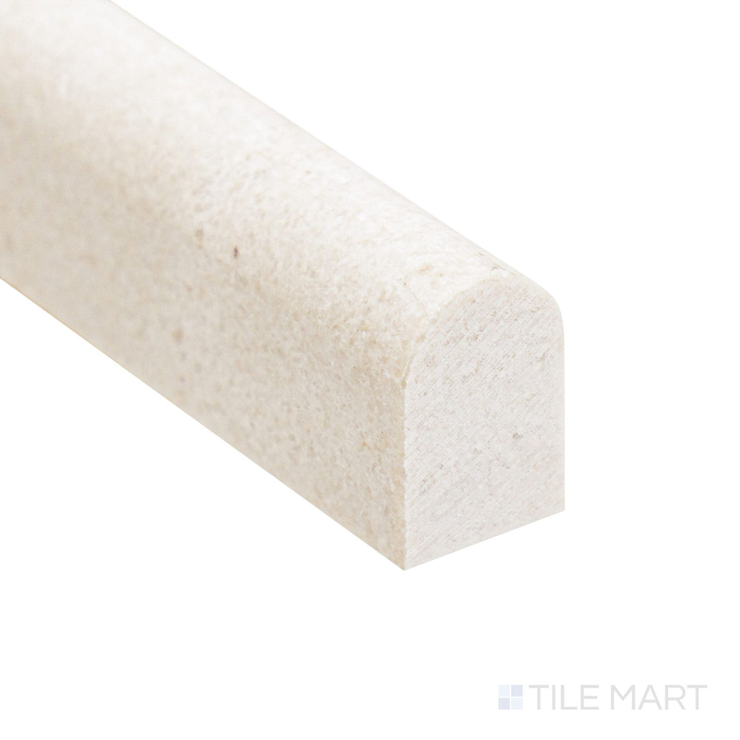 A close look at the Crema Marfil Marble 0.5x12 honed mini liner corner reveals soft texture and delicate beige hue.