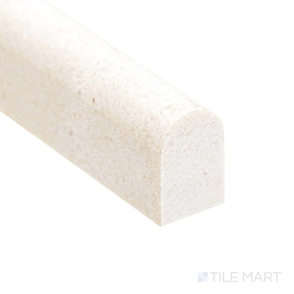 Shining under light, the Crema Marfil Marble 0.5x12 polished mini liner corner captures its creamy tone and sleek profile.