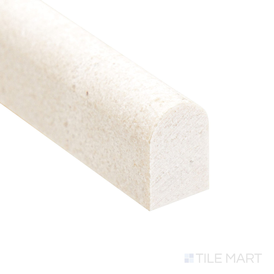 Shining under light, the Crema Marfil Marble 0.5x12 polished mini liner corner captures its creamy tone and sleek profile.