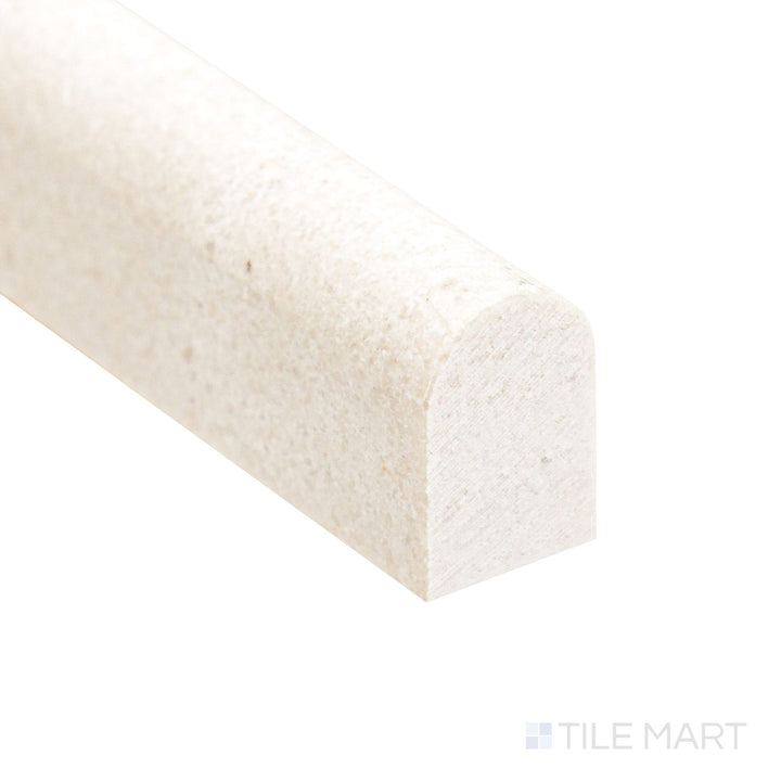 Shining under light, the Crema Marfil Marble 0.5x12 polished mini liner corner captures its creamy tone and sleek profile.