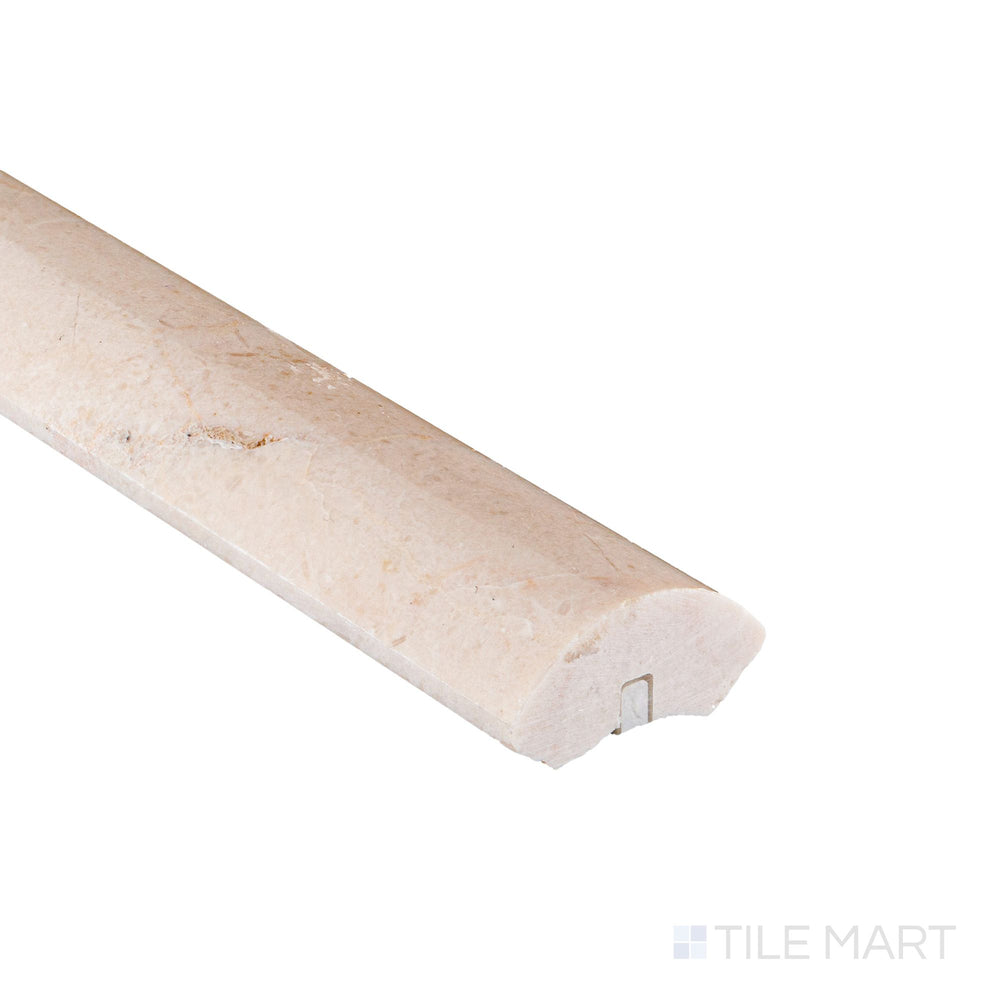 Captured at the corner, the Crema Marfil Marble 1x12 polished quarter round reveals its glossy curve and creamy tone.