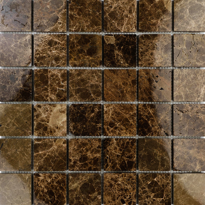 With bold elegance, the Emperador Dark Marble 2" Square Polished Mosaic offers a polished layout of larger square tiles in deep brown hues.