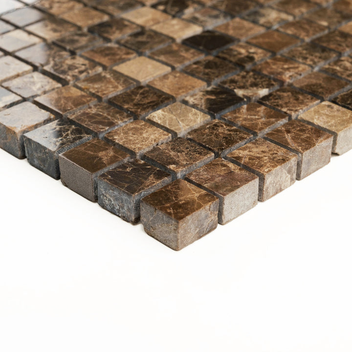Polished 5/8 inch square Emperador Dark marble mosaic angled to highlight its compact pattern and glossy, sophisticated surface.